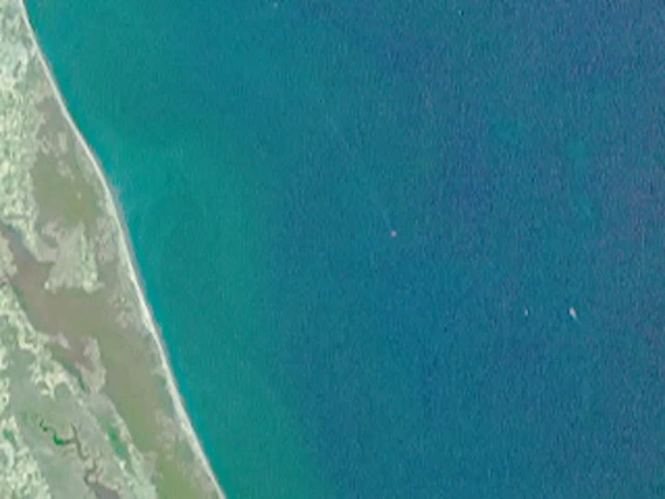 Mixing Waters and Moving Ships off the North Carolina Coast : Image of the Day
