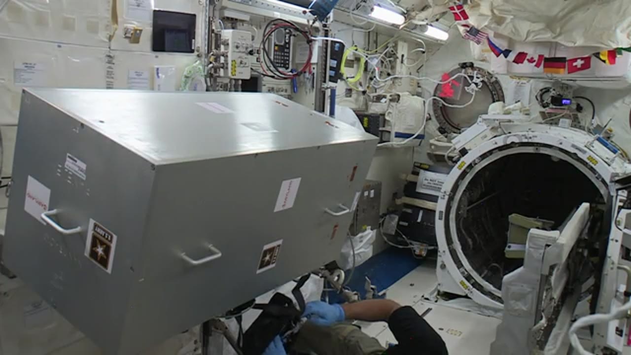 ISS-Downlink-Video_Crew-Working-Kestrel-Satellite-Ops_HD-DL-6_2017_296_0849_576730.mxf