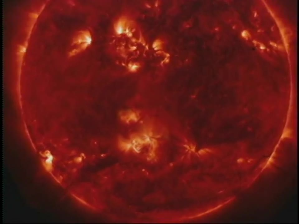 TRACE: Viewing a Coronal Loop with a Diagram of the Earth for Scale.