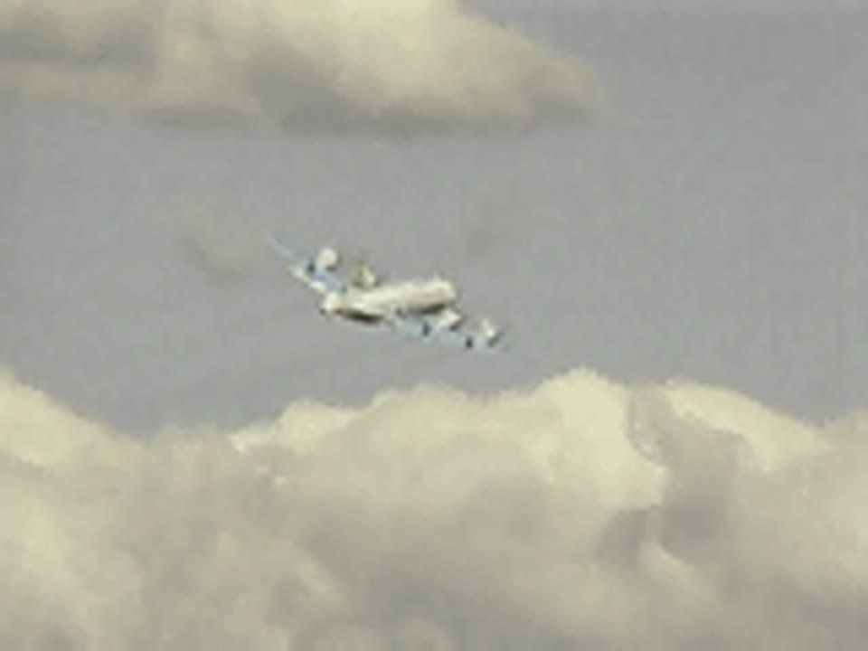 Lockheed Electra - aerial view in flight