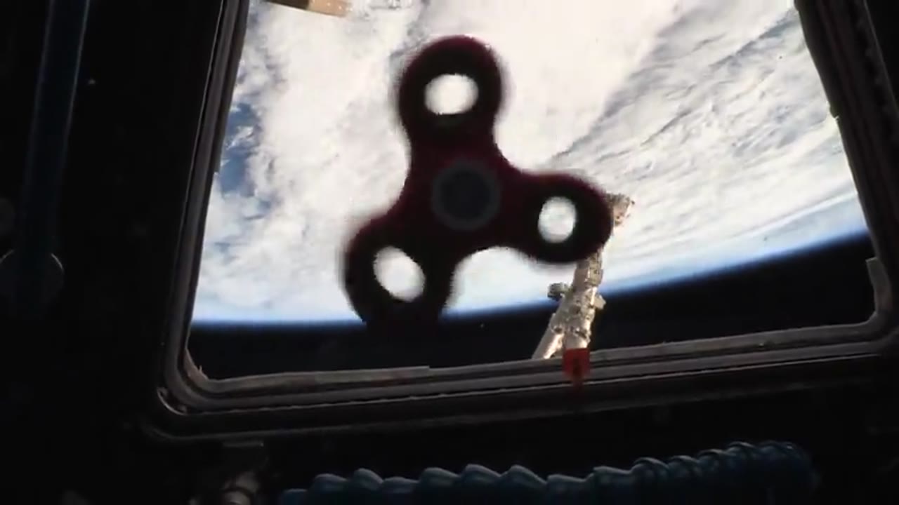 Fidget spinner spinning in space